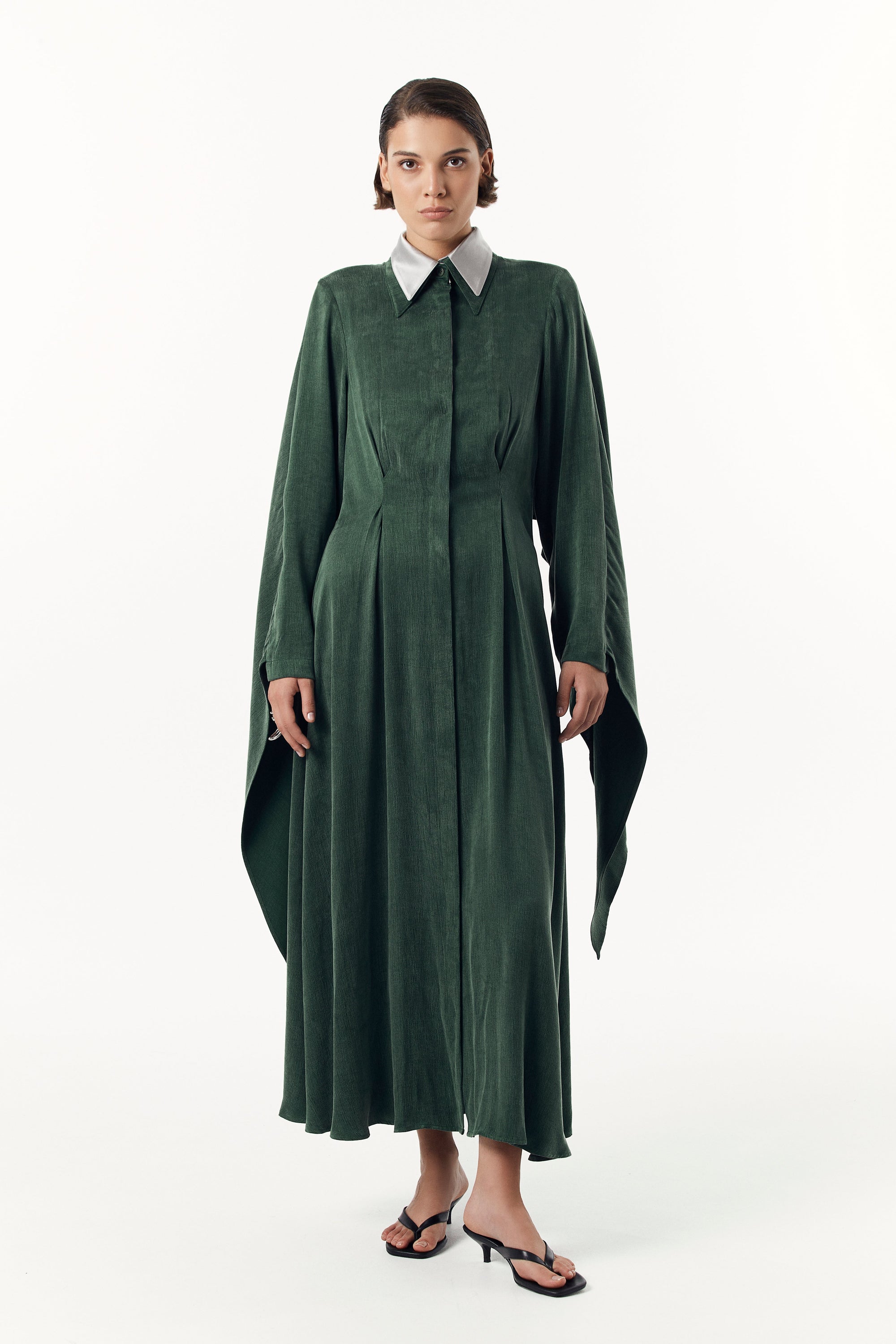 Сукня в зеленому відтінку з шовковим коміром