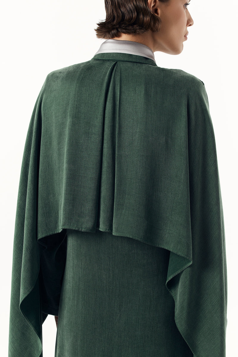 Сукня в зеленому відтінку з шовковим коміром